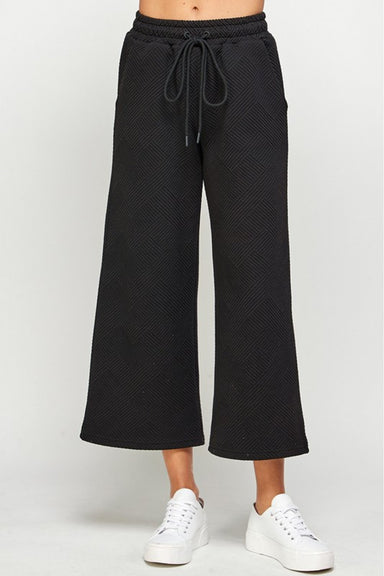 black textured crop pant