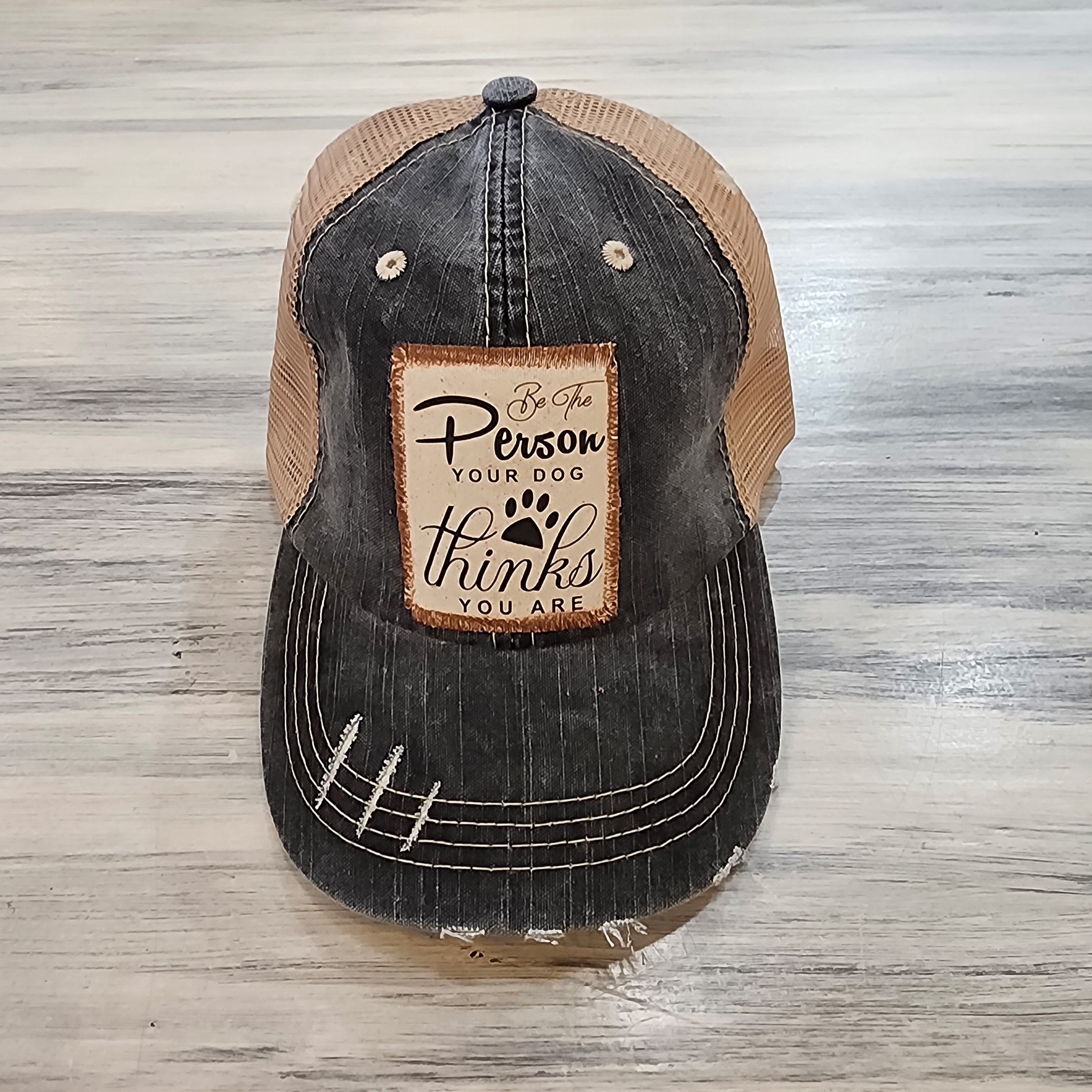 Be the Person Your Dog Thinks You Are Distressed Trucker Hat
