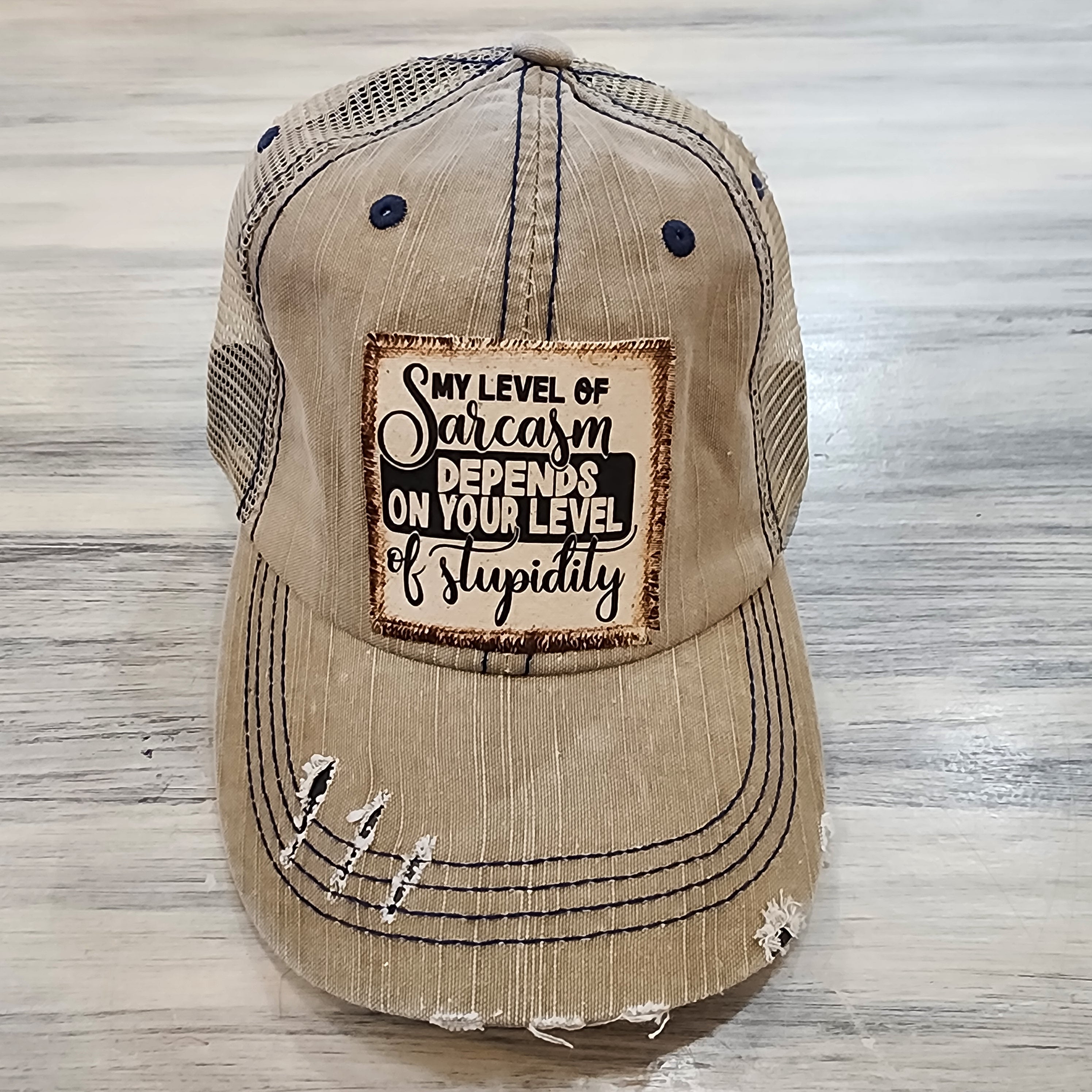 My Level of Sarcasm Depends on... Distressed Trucker Hat