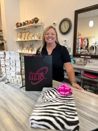 Picture of owner behind the counter