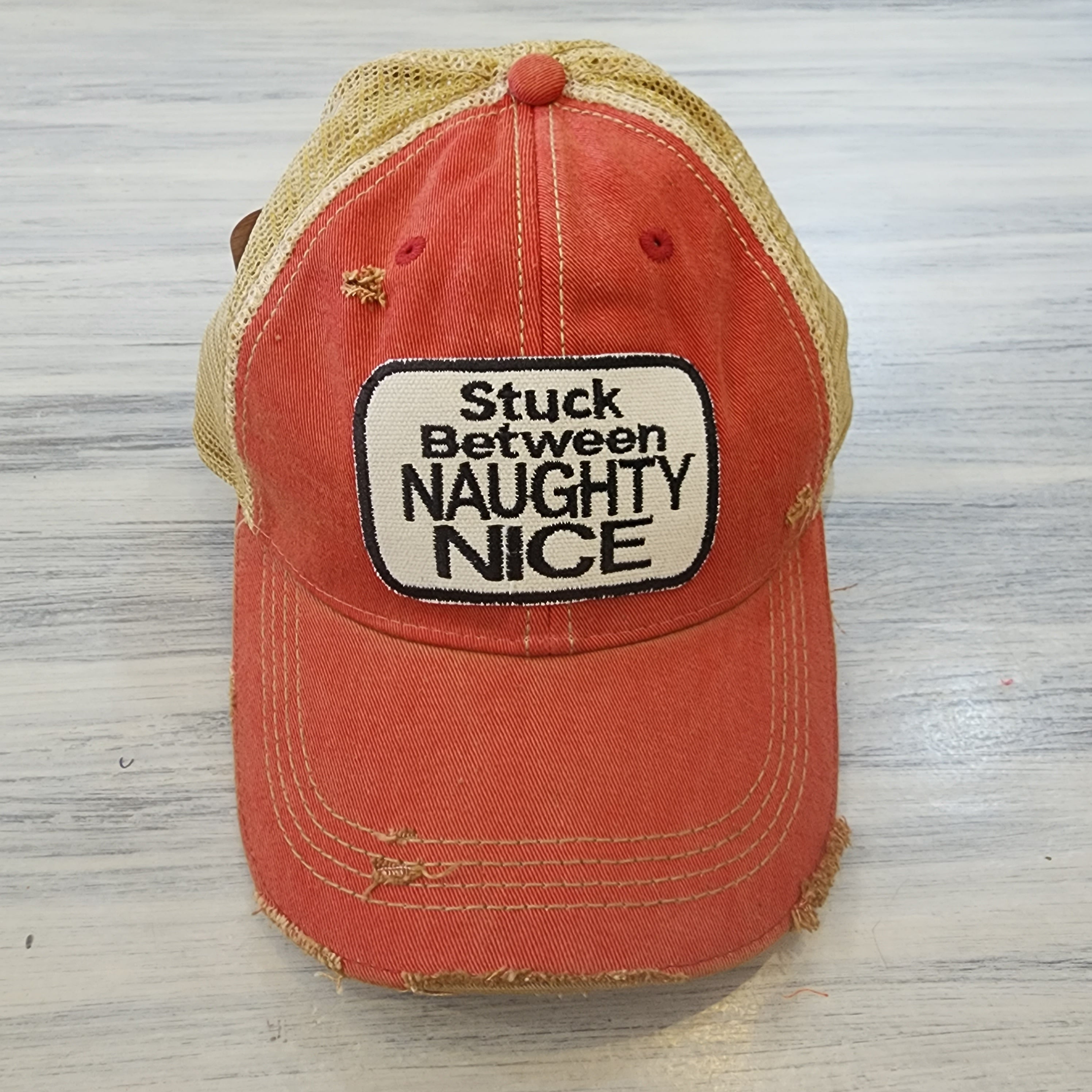 Stuck Between Naughty Nice Baseball Hat