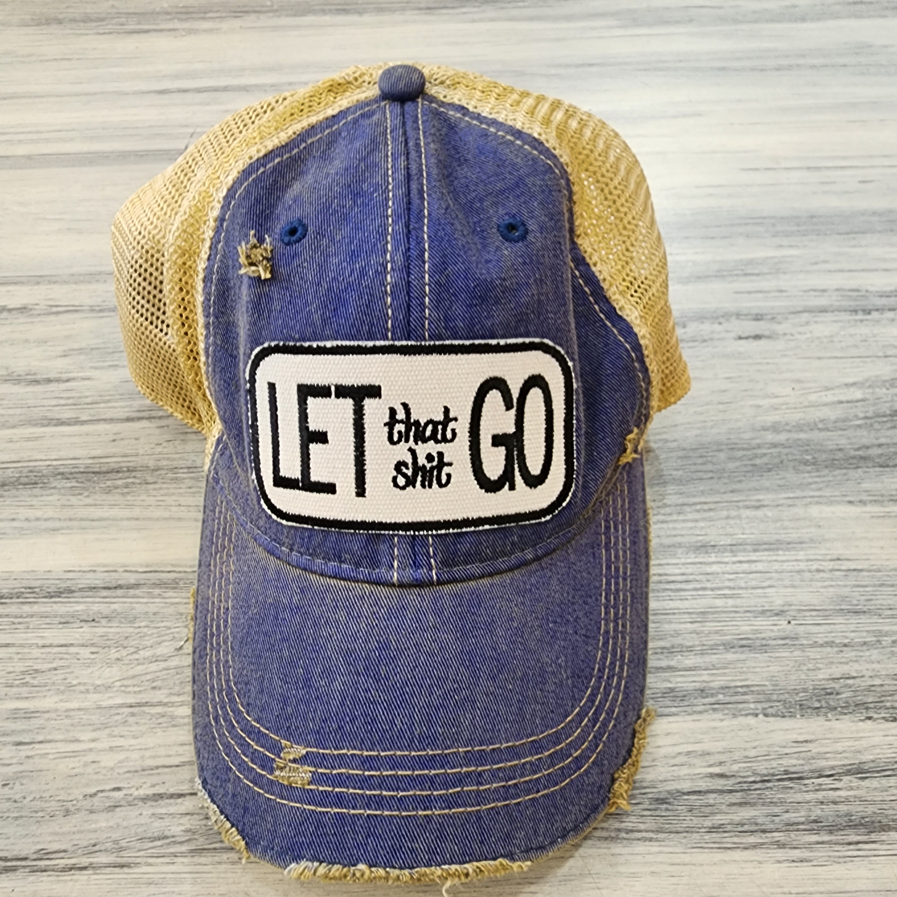 LET that shit GO Baseball Hat